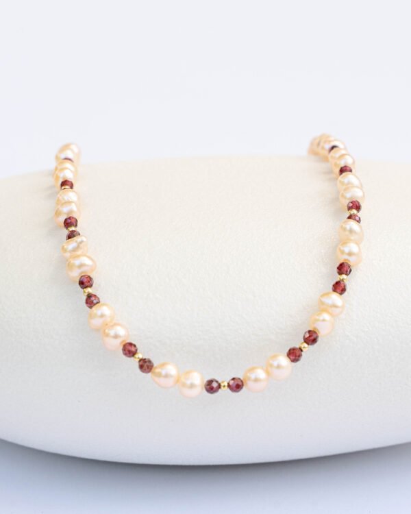 Pink pearl and garnet necklace