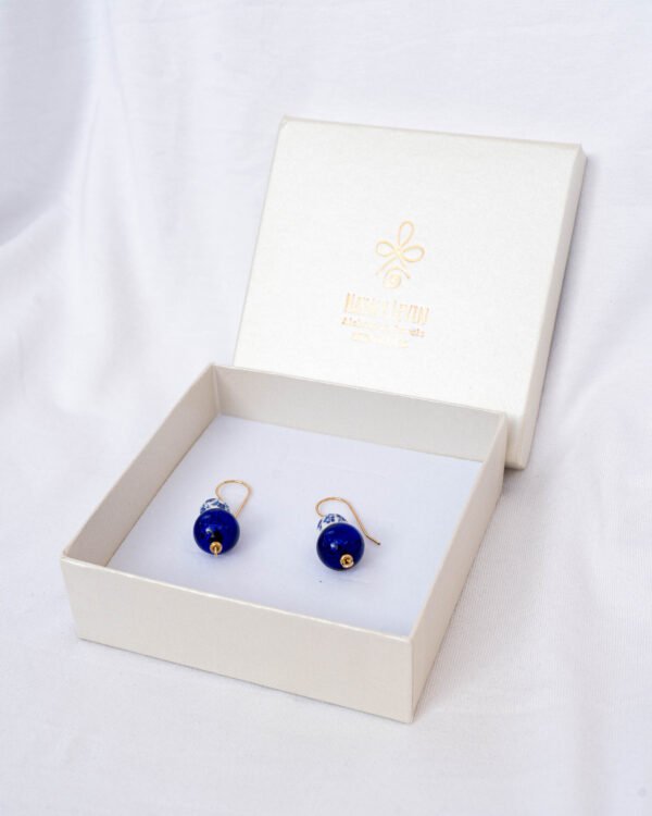 Dutch ceramic bead earrings, and a Greek blue eye bead
